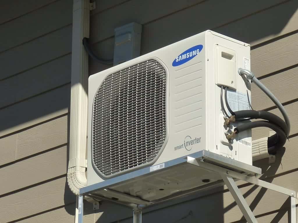 Mini-split heat pump compressor unit for energy-efficient heating and cooling systems.
