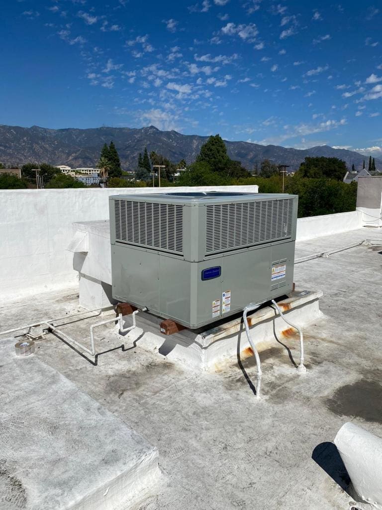 5 ton Commercial AC Installation in Pasadena 2 5 ton Commercial AC Installation in Pasadena CA, professional licensed and bonded HVAC installation with a crane on a commercial building